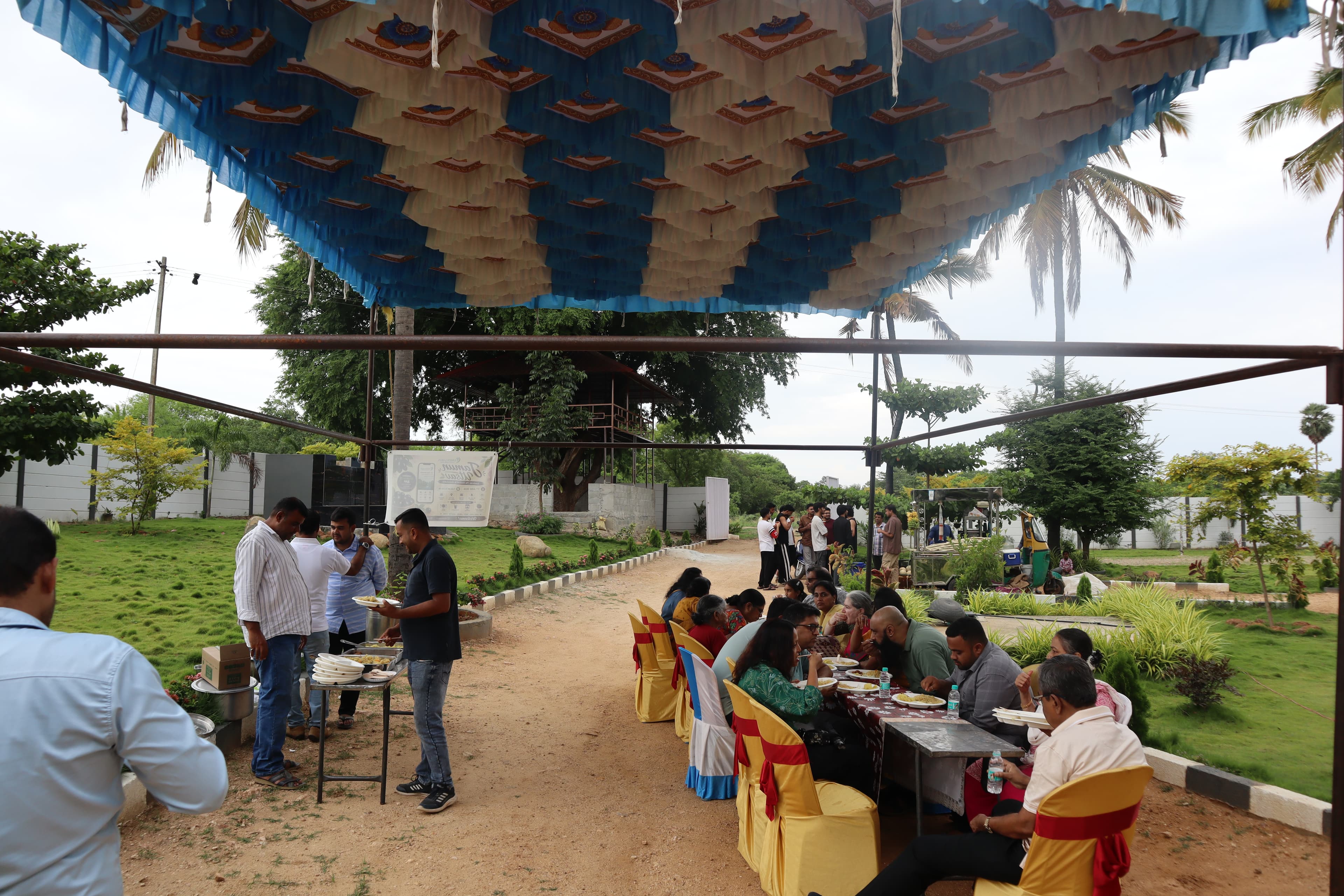 Jamun Festival at Green Lakes with guests gathered under the canopy